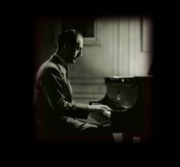 George Gershwin at the piano